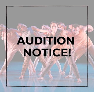 Dancers in group in strong stance peer out to audience together. 