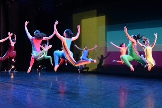 Dancers in colorful costumes.