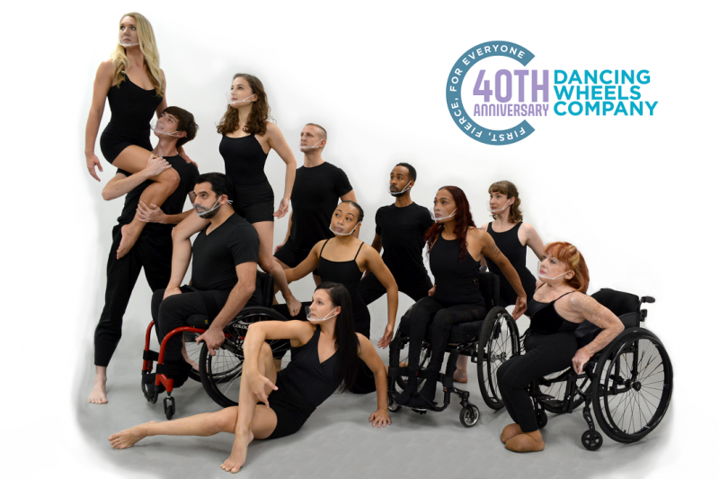 A group standing and seated dancers are arranged in likeness of a mountain slope against a white background with a logo above.