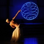 dancer silouhette with blue globe