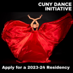 a woman in a long red satin dress bends backwards towards the view against a black background