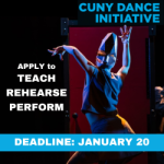 a view from the back of a figure with a mask, arms gestured up against a black background