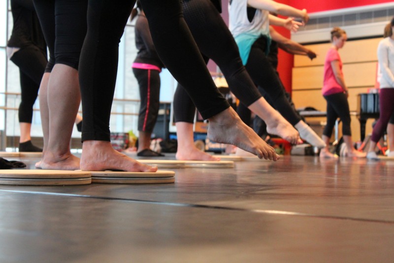 Dancers running through Self-care Practices routine.