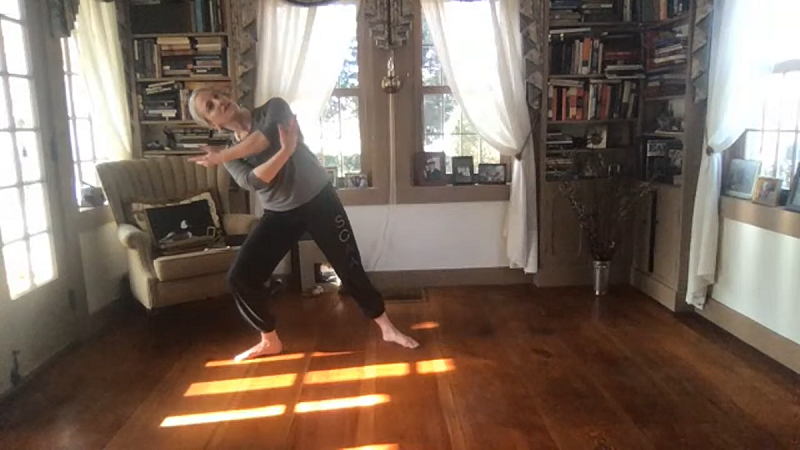 Alex Cook steps into a side lunge.