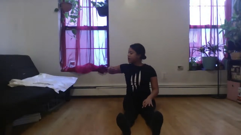 Jessica Pearson demonstrates an arm movement.