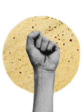 closed fist in front of corn tortilla