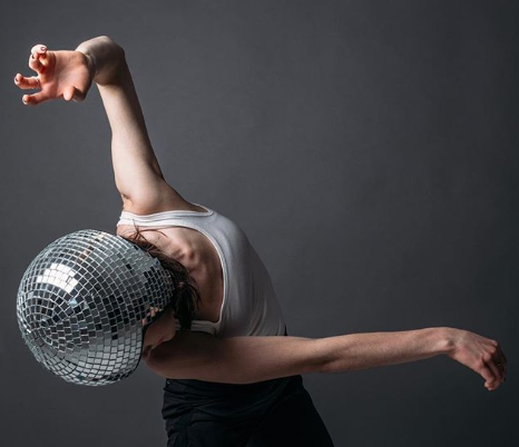 Dancer in disco ball helmet