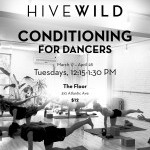 Photo in black and whtie, dancers on mats perform bird/dog exercise