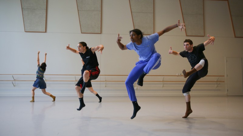 dancers jumping in studio