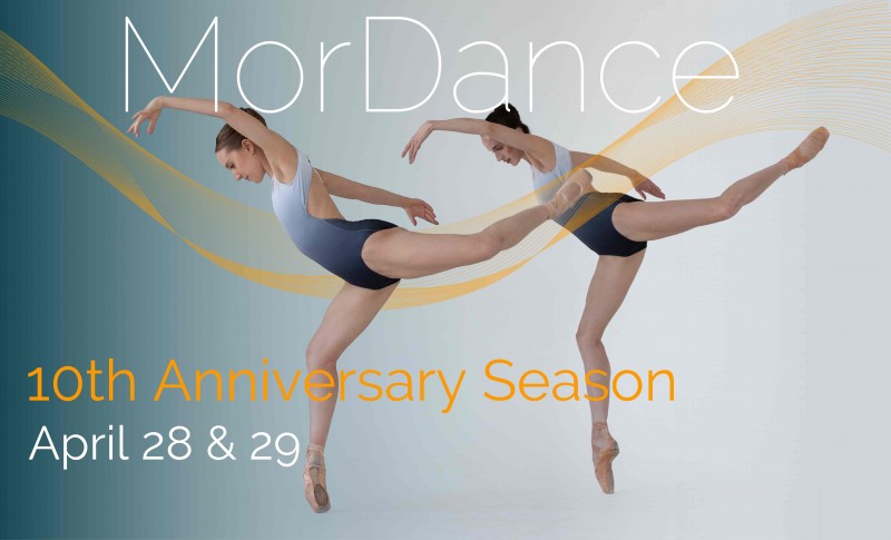 Two women on pointe with left legs outstreached behid them and left arms reaching forward