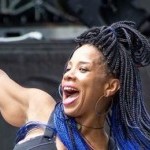 Instructor dancing with arms out