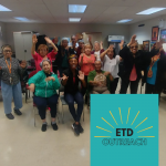 Group of people waving their arms with a blue, black, and yellow etd outreach logo in the bottom right corner.