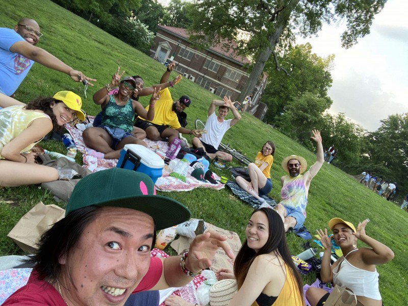 selfie of group of new yorkers having a picnic in prospect park